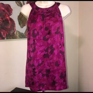 Fuchsia & black floral print halter top.Subtle sequins to add a touch of…